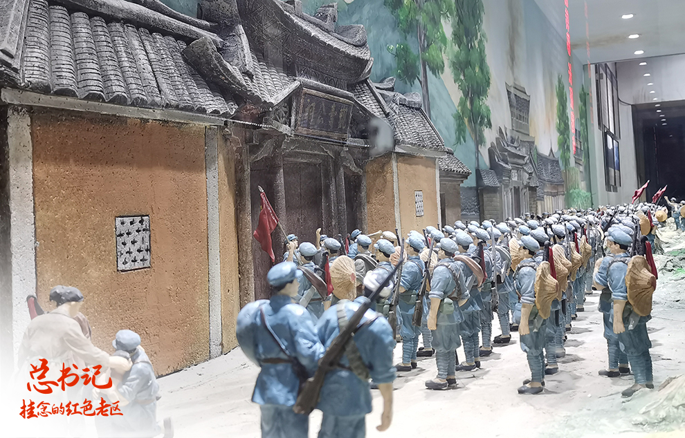 這是在福建省長(zhǎng)汀縣中復(fù)村拍攝的紅軍長(zhǎng)征出發(fā)動(dòng)員會(huì)微型雕塑（2021年4月27日攝）。